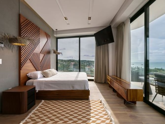 Modern bedroom with ocean view at El Cielo de Sayulita